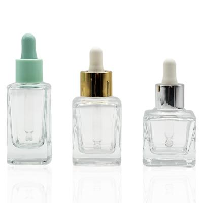 China Cosmetic Essential Square Glass Sliver Dropper Bottle 1oz Gold Cosmetic Dropper Bottle 30ml 35ml for sale