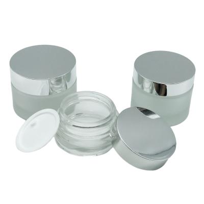 China Custom Cosmetic 30g 50g Frosted Glass Facial Cream Containers And Cosmetic Jars Jar Packaging for sale