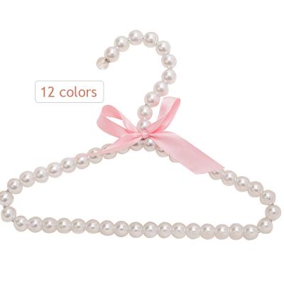 China CLASSIC Wholesale 14cm High End Fashion Clothes Display Clothes White Pearl Hanger Pearl Hanger for sale