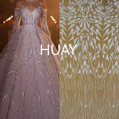 China Viable Hot Selling French Bridal Beaded Tulle Lace Wedding Mesh Sequins Fabrics For Wedding Dress Fabric HY2172-4 for sale