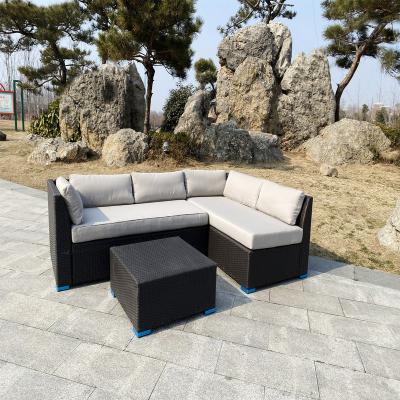 China Modern All Weather Outdoor Rattan Furniture Rattan Sofa Backyard Corner Seat With Wicker Side Table Three Piece Set for sale