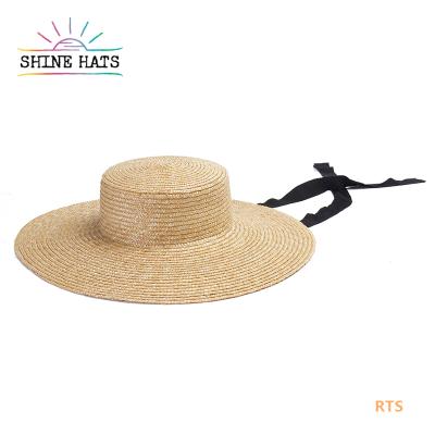 China Designer 2022 striped 64cm large size handcraft wheat straw hat hats wide brim flat surface with ribbon for women ladies summer beach for sale