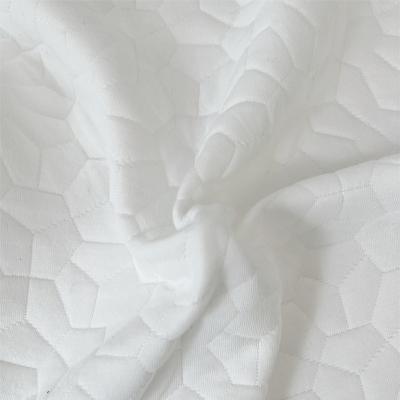 China Stretch Jacquard Fabric Ultra Light Hexagonal Solid Color Polyester Mattress Fabric for sale