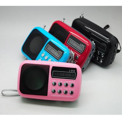 中国 Card selling black/hot pink/blue TF card mp3 music player cheap FM radio speakers 販売のため