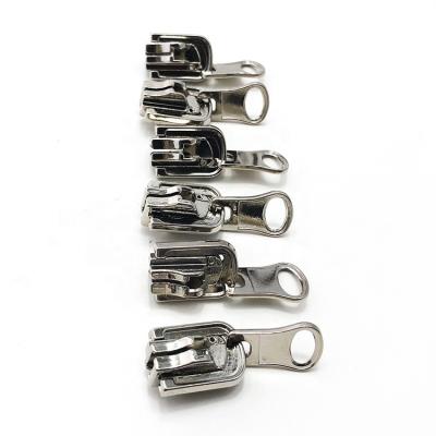 China YYX Metal Nickel Free Reverse Slider Plastic Zipper Pull Reversible Zipper Slider With Thumb Puller for sale