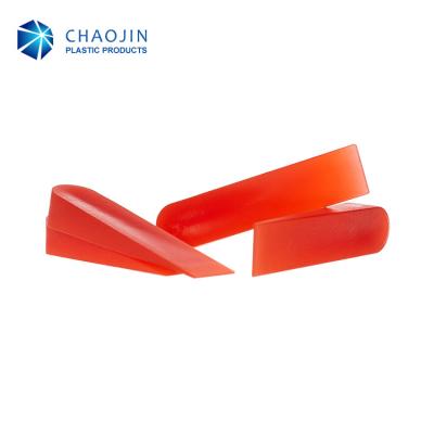 China Small Smooth Surface Plastic Red PP Tile Wedge For Tile Install Tool for sale