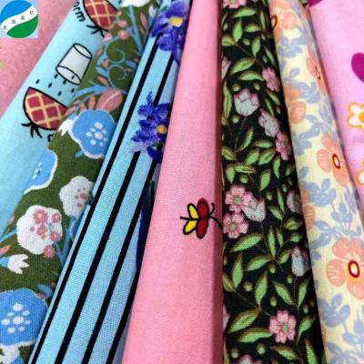 China Wholesale High Quality Cotton Poplin Printing Spell Fusible Spell Running Fabrics Running Fabric for sale