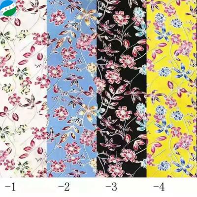 China Soft 100% rayon tela fabric modern design anti pill floral print spell stock for clothing for sale