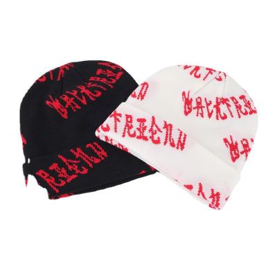 China 100% custom logo jacquard acrylic JOINT designer skullies print skull caps unisex hats for sale