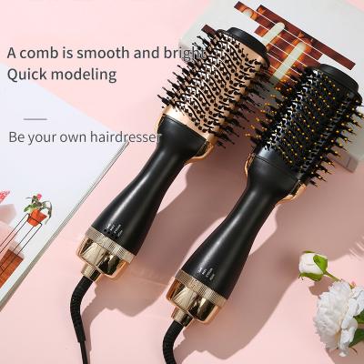 China Other Best Selling Air Blow Dryer Blow Hair Dryer One Stage Pink Ions Hot And Cold Air Wind Blowdryer Brush With Comb for sale