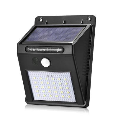 China Factory Hot Sale Outdoor Solar Powered LED Wall Light Solar Outdoor Waterproof Motion Sensor Garden Lights Garden LED Lights for sale