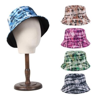 China Fashion Durable Canvas OEM Multi Color Printed Trendy Sunscreen Travel Bucket Hats With Custom Logo for sale