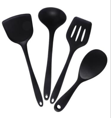 China Durable Nonstick Heat Resistant Black Single Silicone Shovel Kitchenware Leakable Kitchenware Tools Kitchen Easy Tool for sale