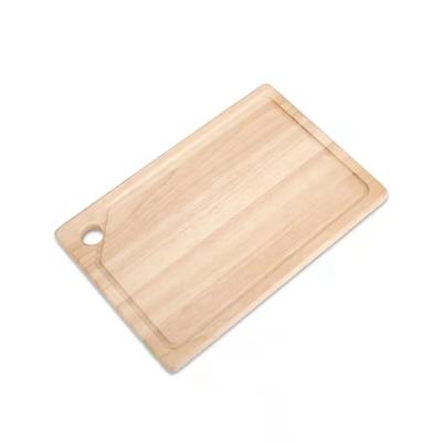 China Sustainable Premium Oak Wood Chopper Solid Wood Washed Cutting Board With Drip Juice Groove for sale