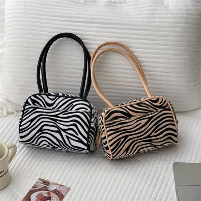 China 2021Winter New Polyester Women's Bag Hand Carrying Zebra Square Popular Pattern Plush Handbag Fashion Small Bag Armpit Bag for sale