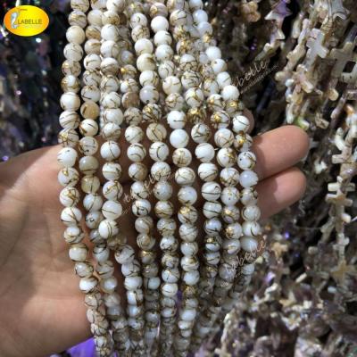 China 100% natural color as per photo 10MM Mother of Pearl Shell Round Beads with lines Gold White Shell Spacer Beads for sale