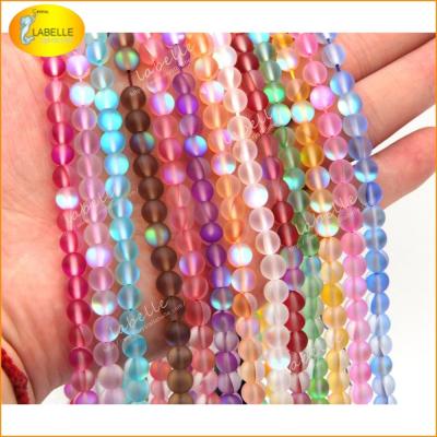 China 10MM Rainbow Mystical Iridescent Mermaid Beads Glass Moonstone Iridescent Glowing Synthetic Beads for sale