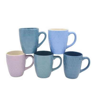 China 11oz Viable Creative Ceramic Mug Simple Belly Shape Mug Set With Embossed Pattern for sale