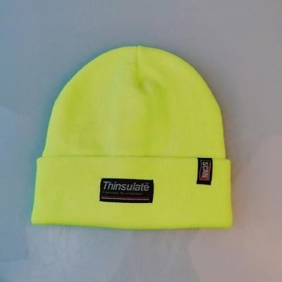 China New COMMON Trend Custom Your Own Woven Label Fluorescein Knitted Iridescent Yellow Beanie Hat Keep Warm Simple Style Winter Hat for sale