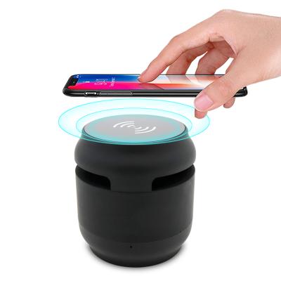 China Wireless charger for mobile phone small mini low MOQ bluetooth music box subwoofer speaker with wireless charger for sale