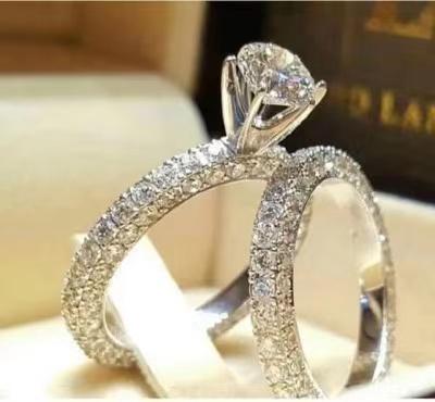 China 2021 Amazon Hot Sale Women Diamond Wedding Rings Fashion Silver Plated Couple Engagement Rings Sets for sale