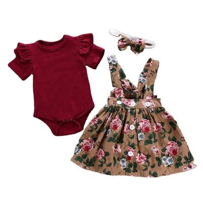 China Late Summer Sustainable Babies' Floral Slip Dress With Solid Short Sleeve Romper Two Pieces Baby Clothing Sets for sale