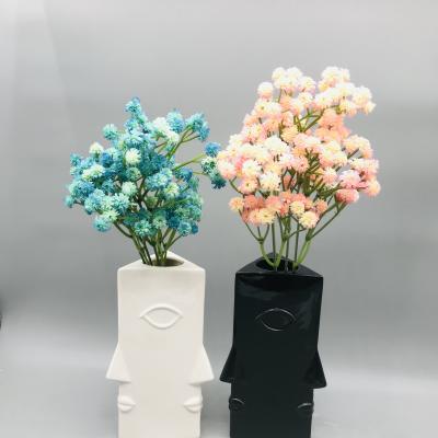 China Modern Design Eco-friendly Ceramic Triangular Prism Human Face Vase Home Decoration for sale