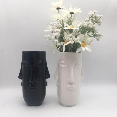 China Home Vase Porcelain Eco - Friendly Popular Design White And Black Human Face Decoration for sale