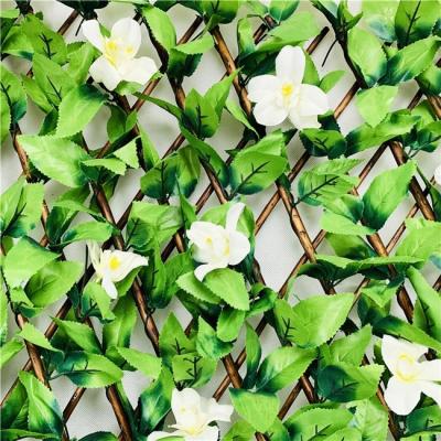 China High Quality Easily Assembled Artificial Boxwood Hedage Leaf With White Clematis Trellis Flowers for sale