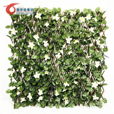 China Instant Privacy Monstera Deliciosa Fence With Leaves Nice Leaf Artificial Widening Fence Easily Assembled UV Stable Suitable Artificial Fence For Outdoor for sale