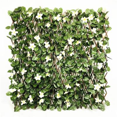 China Easily Assembled UV Stable Outdoor Decorative Expanding Plastic Ivy Leaf Screen Artificial Green White Flower Instant Privacy for sale