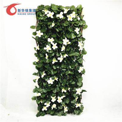 China Easily Assembled Outdoor Home Decoration Privacy Screen Garden Artificial Willow Leaf Fence Roll With Flower for sale