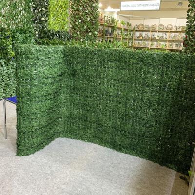 China Easily Collected Artificial Grass Fence 1x3m New Conifer Screening Artificial Hedge Plastic Leaf Fence for sale