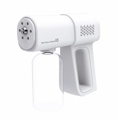 China 2021 New Atomizer Fogger Machine Handheld Rechargeable Cordless Nano Grip Atomization Disinfections Blue Ray Gun Cordless Spray Gun for sale