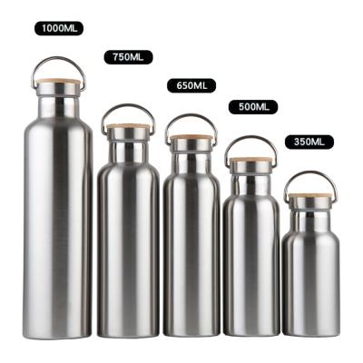 China New Hot New Stocked Modern Customized Logo Sport Drink Double Walled Branded Stainless Steel Water Bottle With Bamboo Lid for sale