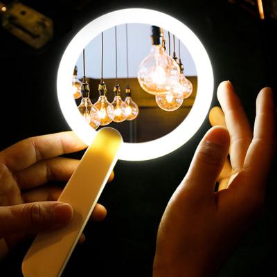 China Lighted Handheld Mirror Led Low Moq Logo Small Portable Handheld Makeup Mirror Light Wholesale Custom Plastic Travel Mirror for sale