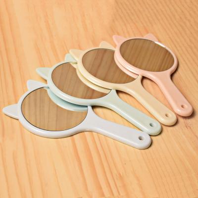 China Wholesale Custom Cosmetic Mirrors Cat Ear Shape Plastic Custom Hand Mirror With Handle for sale