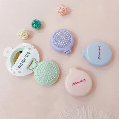 China New Foldable Makeup Comb Hair Brush Pro Styling Mini Round Travel Styling Portable Hair Brush Airbag Massage Tool With Mirror for sale