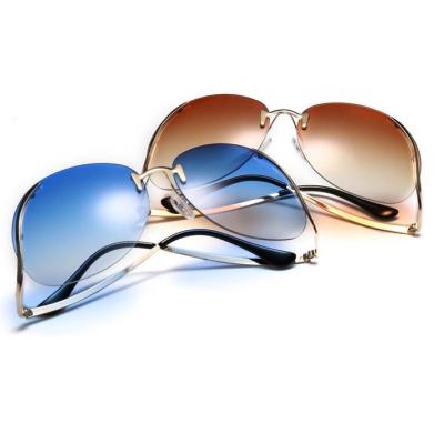 China 15 Years Experience 2021 Designer Brand Newest Fashion Rimless Curvature Leg Glass Women Sun Glasses 2022 Trendy Colorful Oversized Sunglasses Shades for sale