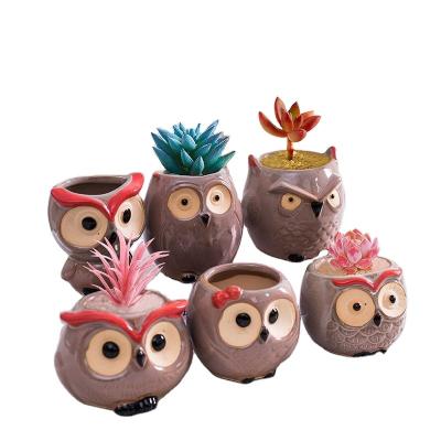 China Outdoor Indoor Planter Mini Small Flower Cheap Modern Ceramic Pot Cartoon Style Plant Pots Wholesale Decor Office for sale