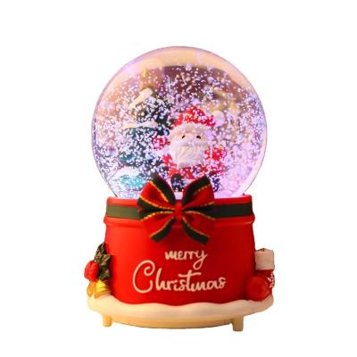 China High Quality New Design Artificial Souvenirs Snow Globe Christmas Gift Customized Resin Music Box Decoration for sale