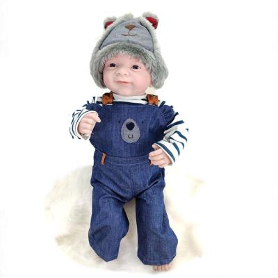 China DIY TOY 0-3 years old wholesale new arrival lifelike vinyl baby doll with lattice fabric for kids play for sale