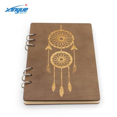 China Dongguan factory wholesale hardcover notebook with wooden cover and engraved pattern for sale