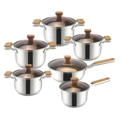 China Sustainable Newcomers Luxury 12 Pcs Non Stick Stainless Steel Cookware Set With Wood Handle for sale