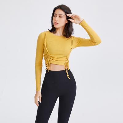 China Women's Sports Yoga Tops Breathable Long Sleeve Tight Quick Dry Drawstring Slim Wear for sale