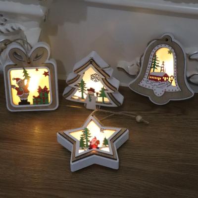 China DIY Christmas Decoration Family Christmas Ornaments Wooden Tied Lantern With LED Light Star Frame Warm Christmas Lantern for sale