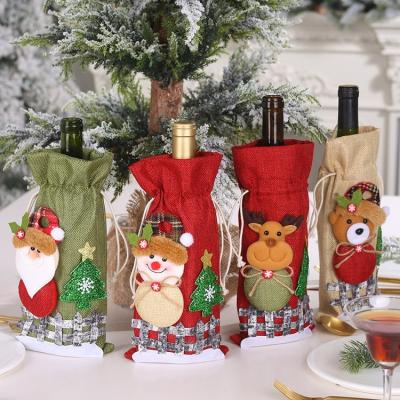 China Wholesale Accessories Snow Cartoon Drawstring Lattice Doll Wine Bottle Canvas Bag Christmas Ornament Christmas Decoration for sale