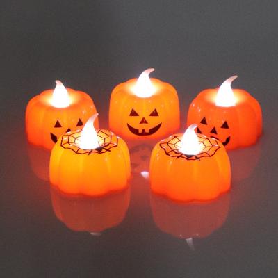 China Festival Decoration Toys Halloween Decor Led Tea Light 3D Candles Hot Pumpkin Flameless Candles for sale