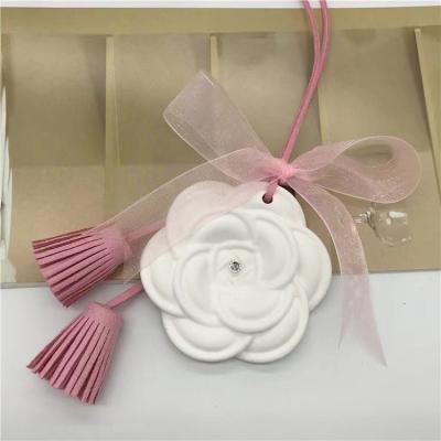 China Birthdays Camellia Shape Scented Plaster Ladies Car Interior Perfume Car Pendant for sale