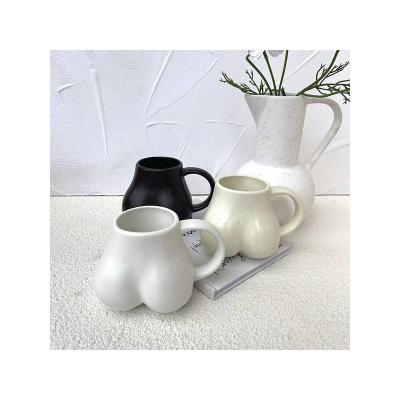 China Factory direct sale new creative ceramic milk cup coffee mug design style butt shape HANDLE for sale